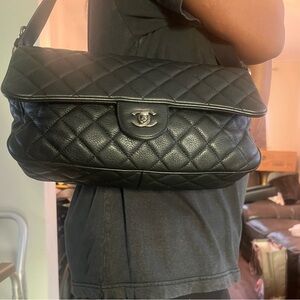 Chanel large shoulder bag with tags.